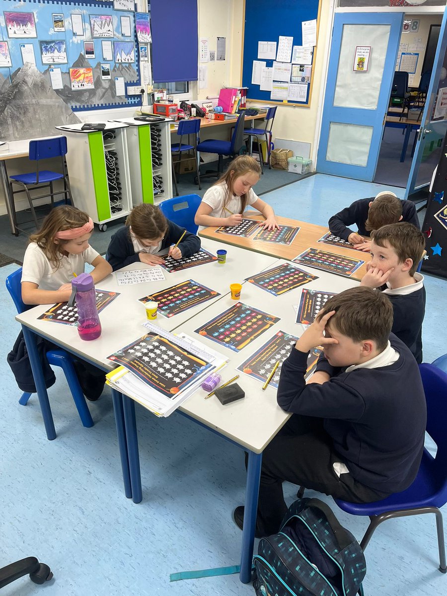 Hand writing club with Mrs Miller, the children are making so much progress! They are writing the space invader alphabet!