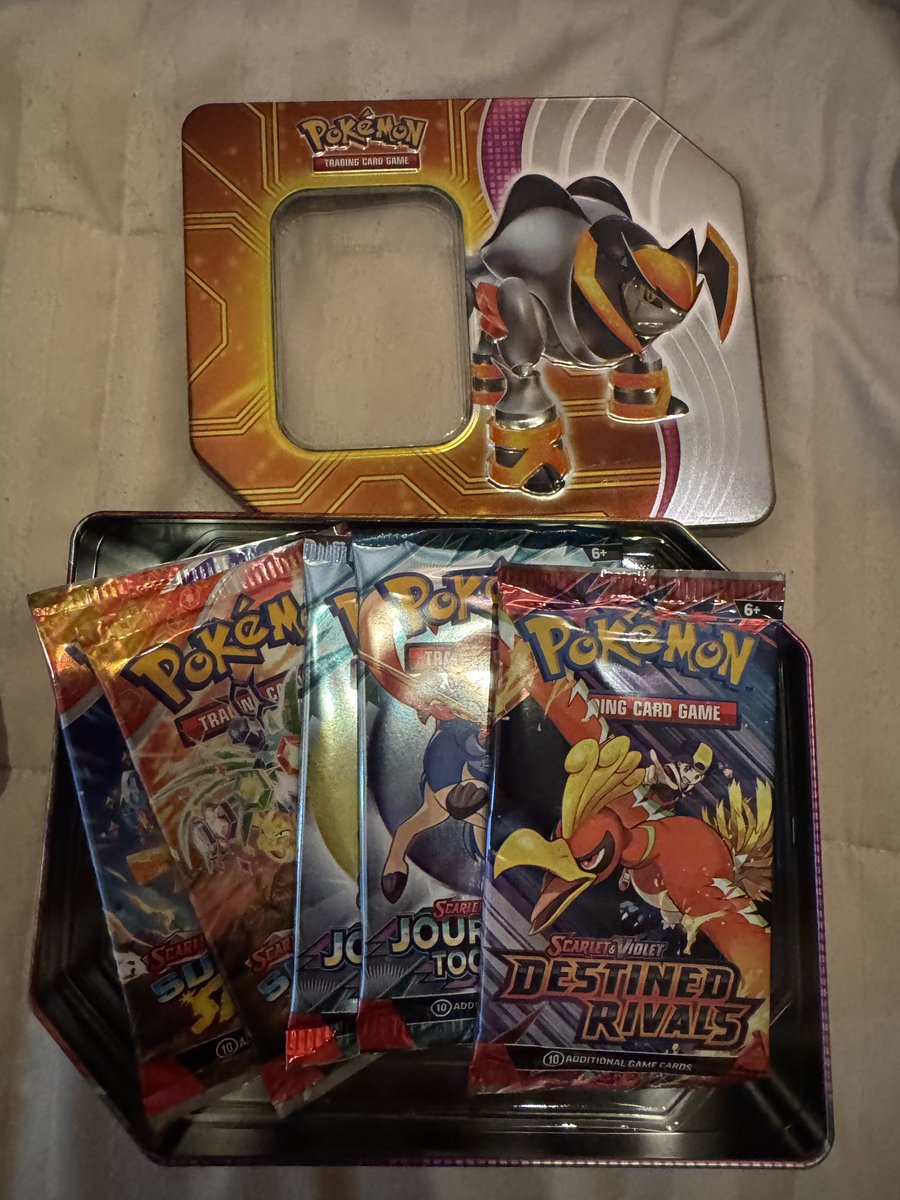The Walmart Black Friday Pokemon Tins were packing HEAT!

Love this pack selection