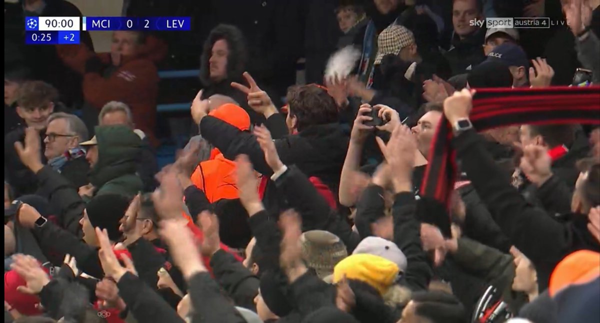 ComicKodi's tweet image. Leverkusen fans waving bye and showing the 2:0 to the city fans as the “citizens” begin leaving the stadium. #MCILEV