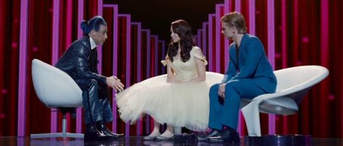 everlalark's tweet image. he’s telling peeta that he’s his ADHD and katniss that she’s his autism