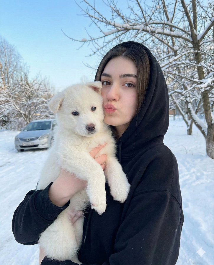 Portrait with Puppy in Snow
