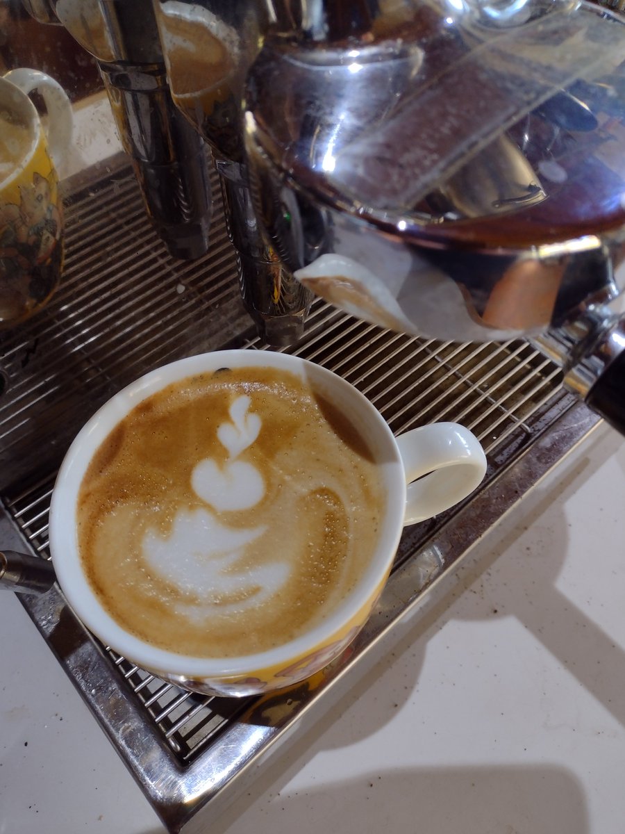 Home from town, have a nice, double shot latte and a slice of banana bread😋