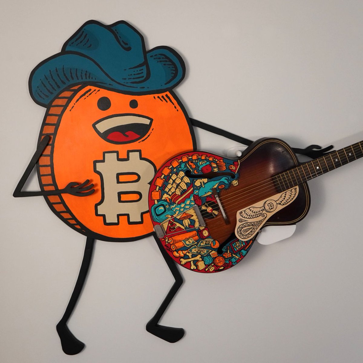 BitcoinArtMag's tweet image. Bitcoin Guitar &amp;amp; Cowboy Bitcoin Guy by @MarcusConnorNH
