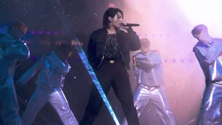 TheePopCore's tweet image. Jungkook has been featured in the Official 2026 FIFA World Cup poster, spotlighting his iconic performance at the Qatar 2022 World Cup as part of a collage of historic moments.