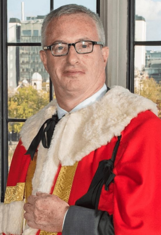 <a href="/DoubleDownNews/">Double Down News</a> This is the puppet master behind Patel that lurks in the shadows and shuns the limelight. This beaut is called Lord Stuart Polak, the Zionist go between of Israel government and UK government high echelons.