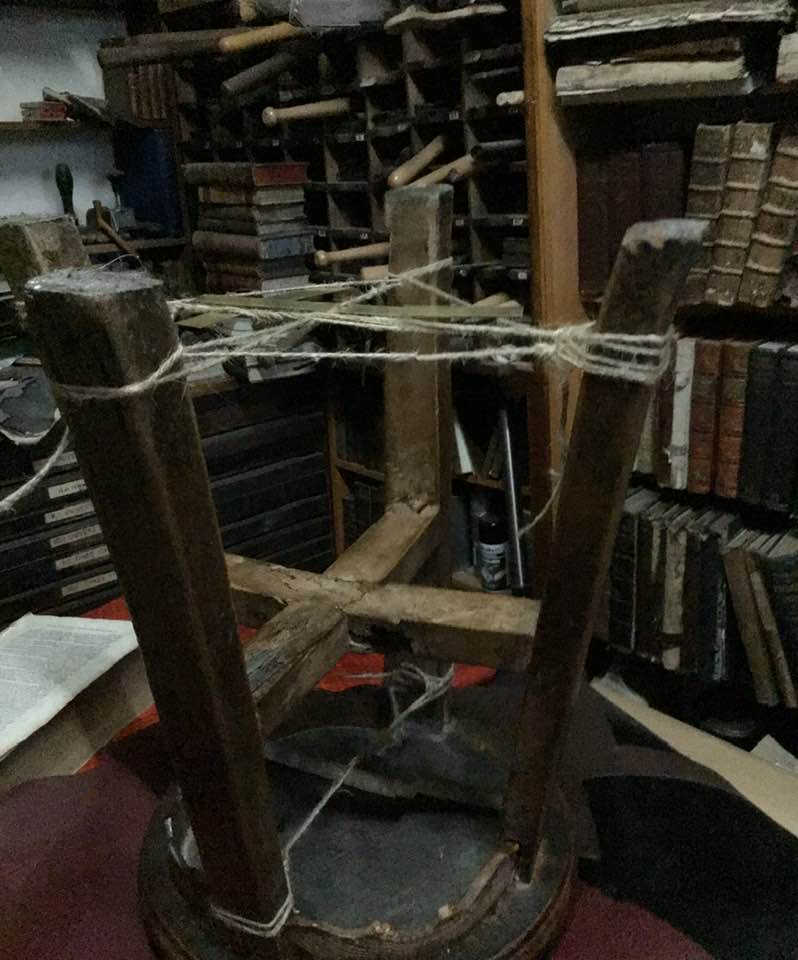sallyevanz1's tweet image. deary me,
ask the bindery staff to repair the Victorian goldfish bowl stand we use as a kitchen stool, and they dab all surfaces with glue, then warp it all back together with binder&apos;s string and reglets #bookbinding
