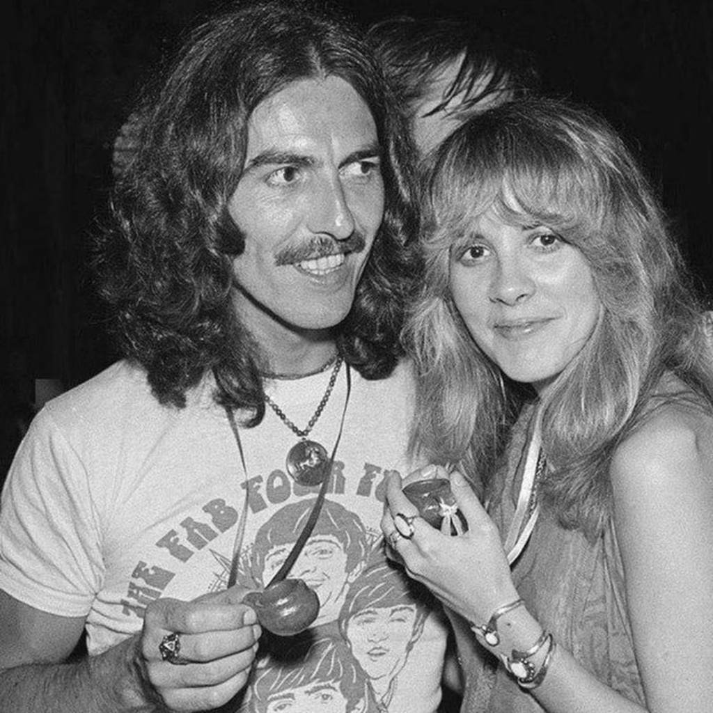<a href="/crockpics/">Classic Rock In Pics</a> Two absolute icons in one frame. 🎸✨

I ran this through rephoto.app to see if I could sharpen the details without losing the 70s vibe. The 'after' side (left) really highlights the clarity of George's smile and Stevie's style. Hope you like it!