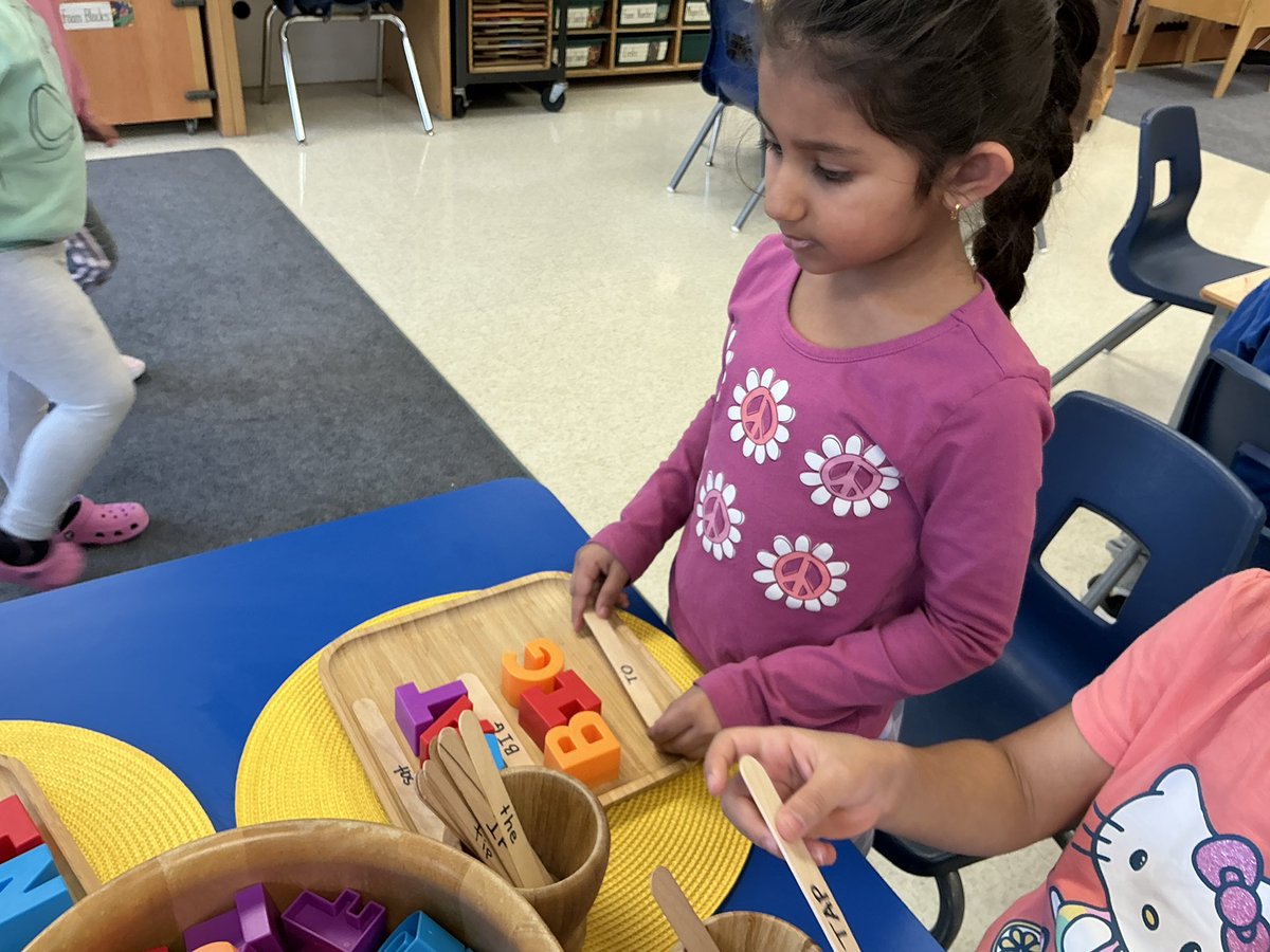 KingswoodKinder's tweet image. M.S. is identifying letters and decoding/building/writing different CVC and high frequency words using the alphabet blocks.