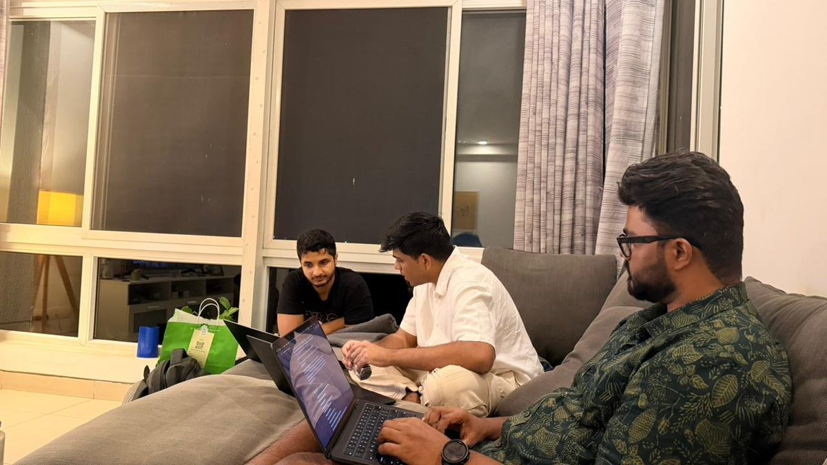 Me reviewing <a href="/viditchess/">Vidit Gujrathi</a> vibe coding skills while <a href="/ajinkya_shejul/">Ajinkya Shejul</a> reviewing my coaching skills, perfect picture. x.com/viditchess/sta…