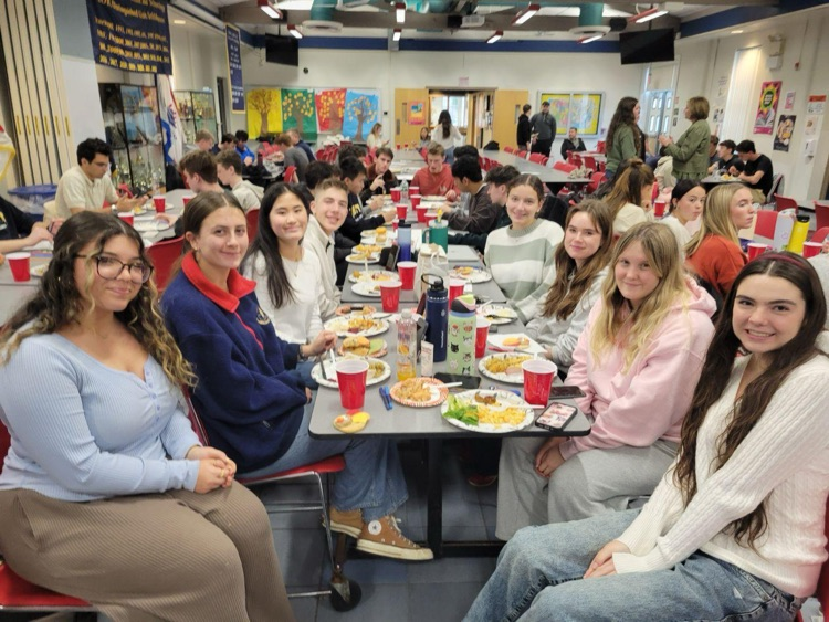 Seniors are sharing a Friendsgiving feast together, while also spreading cheer by writing greeting cards to soldiers, hospitalized children, and senior citizens