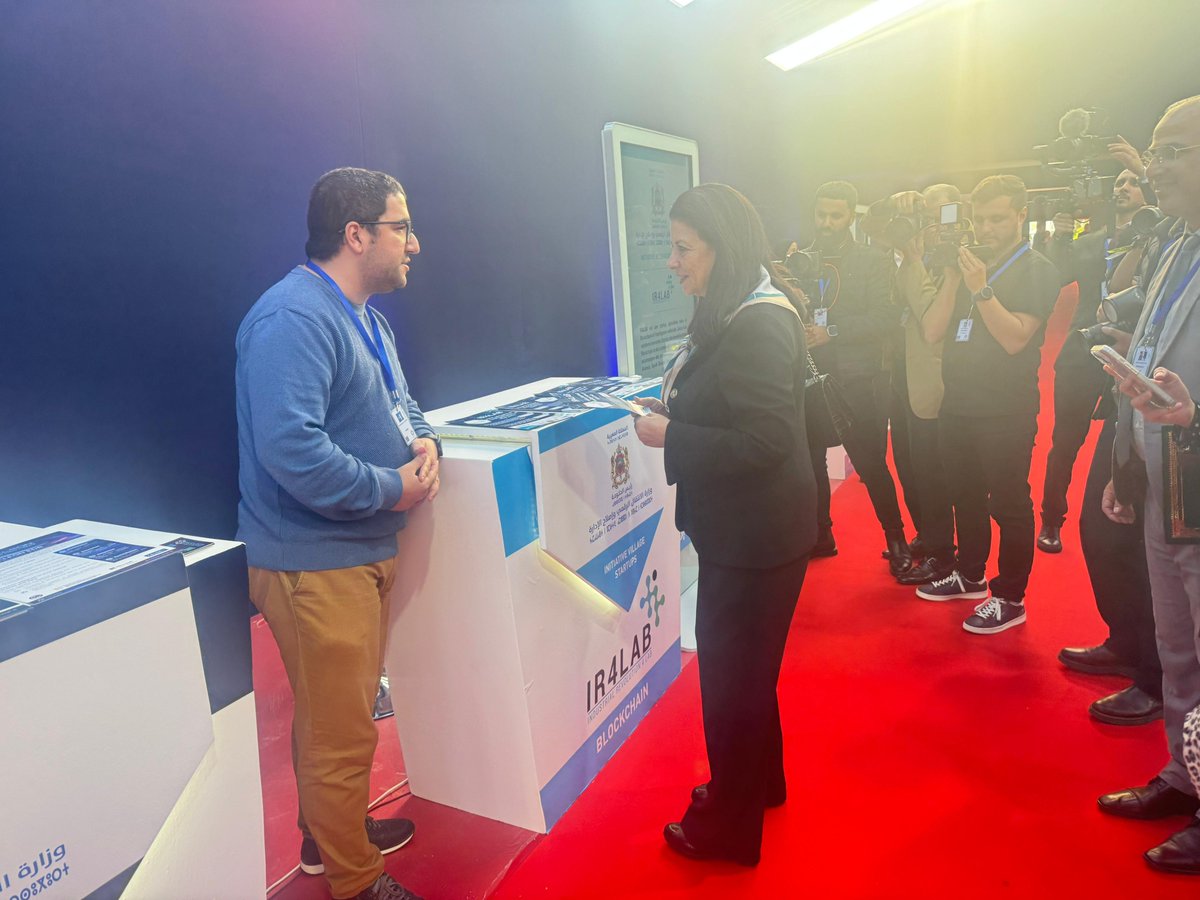IR4Lab's tweet image. The #IR4Lab had the honor of welcoming Her Excellency the Minister Delegate for #Digital Transition and Administrative Reform, Amal El Fallah Seghrouchni, to our booth at the forum. We presented her with an overview of our latest #technological solutions in #blockchain.🇲🇦🚀