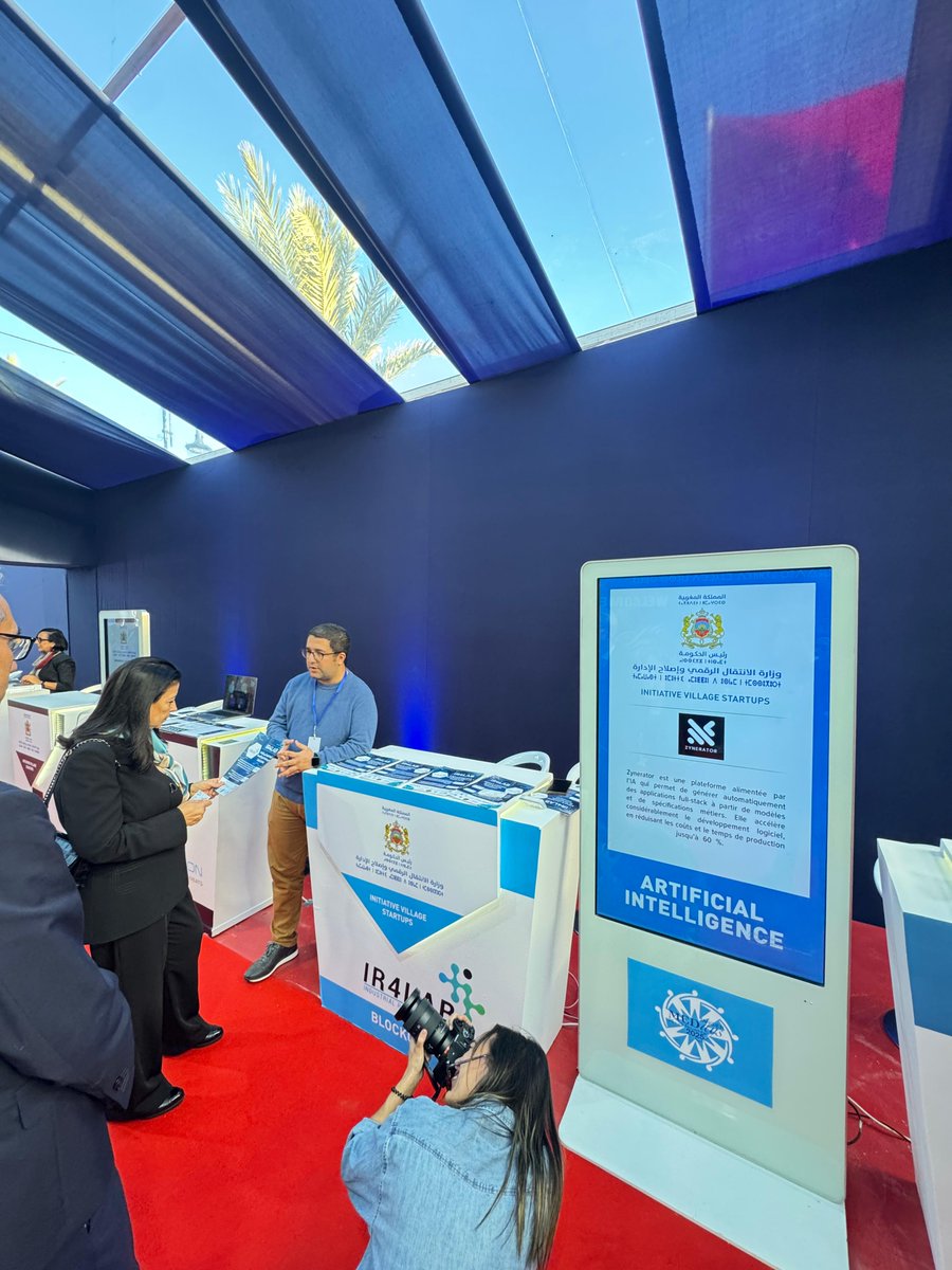IR4Lab's tweet image. The #IR4Lab had the honor of welcoming Her Excellency the Minister Delegate for #Digital Transition and Administrative Reform, Amal El Fallah Seghrouchni, to our booth at the forum. We presented her with an overview of our latest #technological solutions in #blockchain.🇲🇦🚀