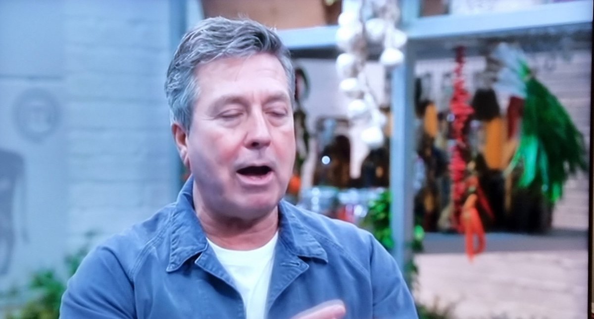 Who does John Torode think he's talking to when he says stuff like "He's got to be sure the chicken's not dry" on #CelebrityMasterchef and recounts what people have just seen on an episode?

If those bits were cut then the episodes could be done in 15 minutes.