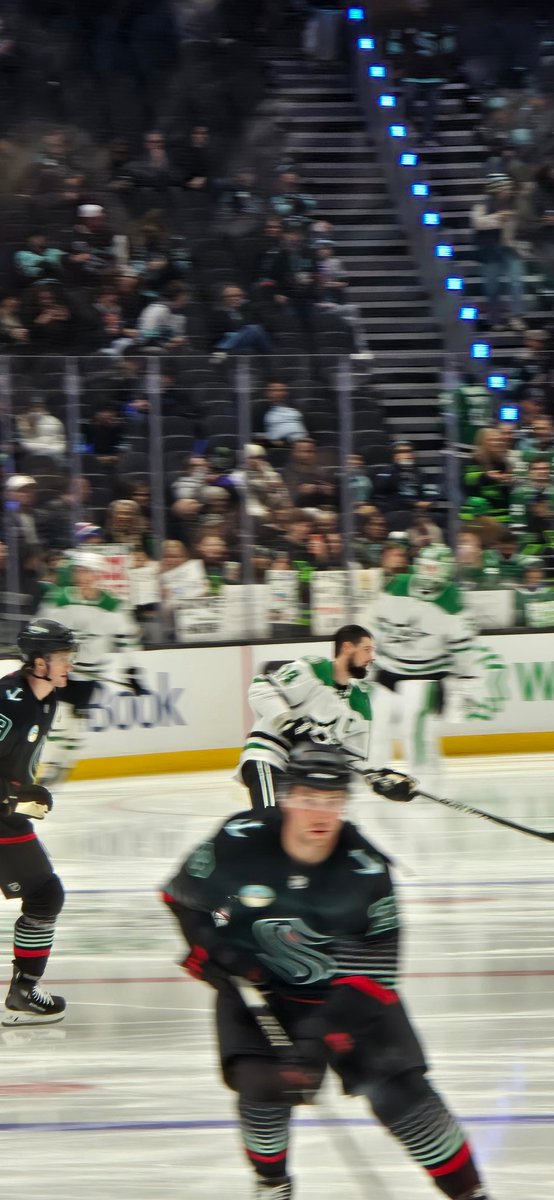 vball40's tweet photo. 3 rows from the ice for the @DallasStars game at @SeattleKraken with @AJSDeadsnow https://t.co/8fmKZ3iTZx