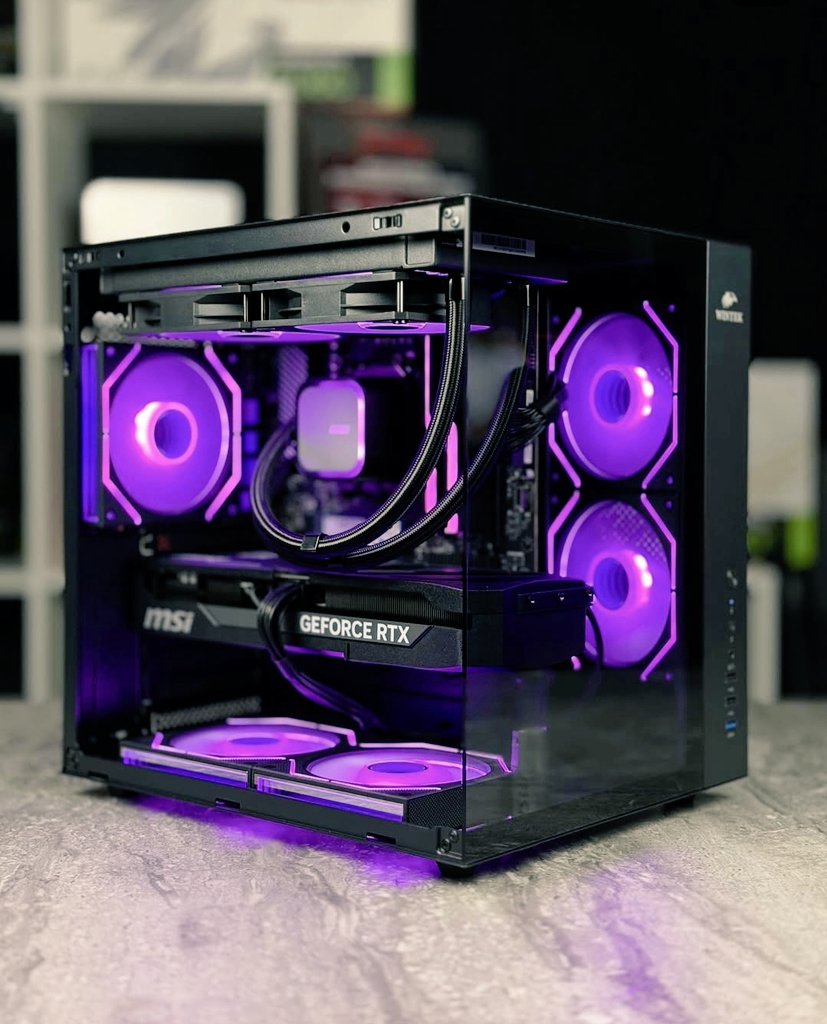 Purple Power in a Small Form Factor This build hits different.

Compact, clean, and absolutely glowing - fully stacked with an RTX beast, custom cooling, and that perfect purple aesthetic. Every angle, every fan, every cable... dialed in.

Not for sale.

Just appreciating the