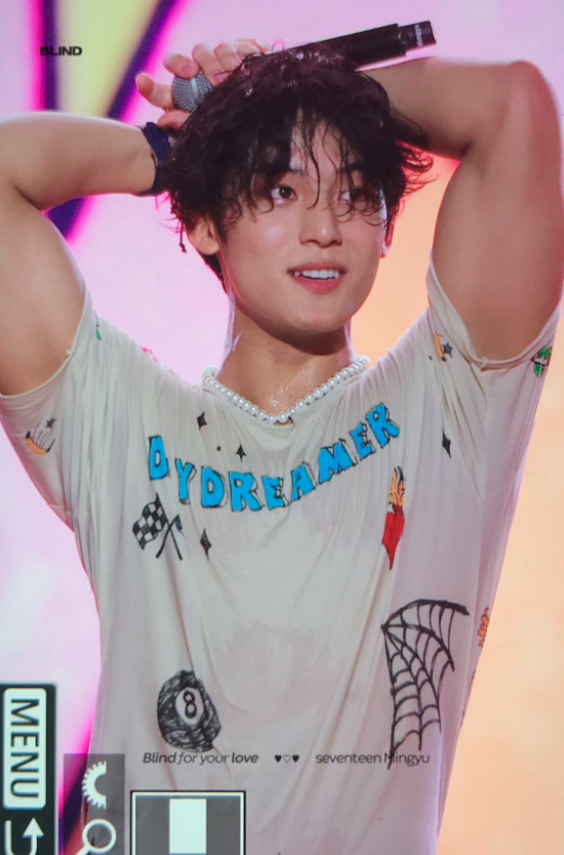 Mingyu of SEVENTEEN on stage at Lollapalooza, 2024.