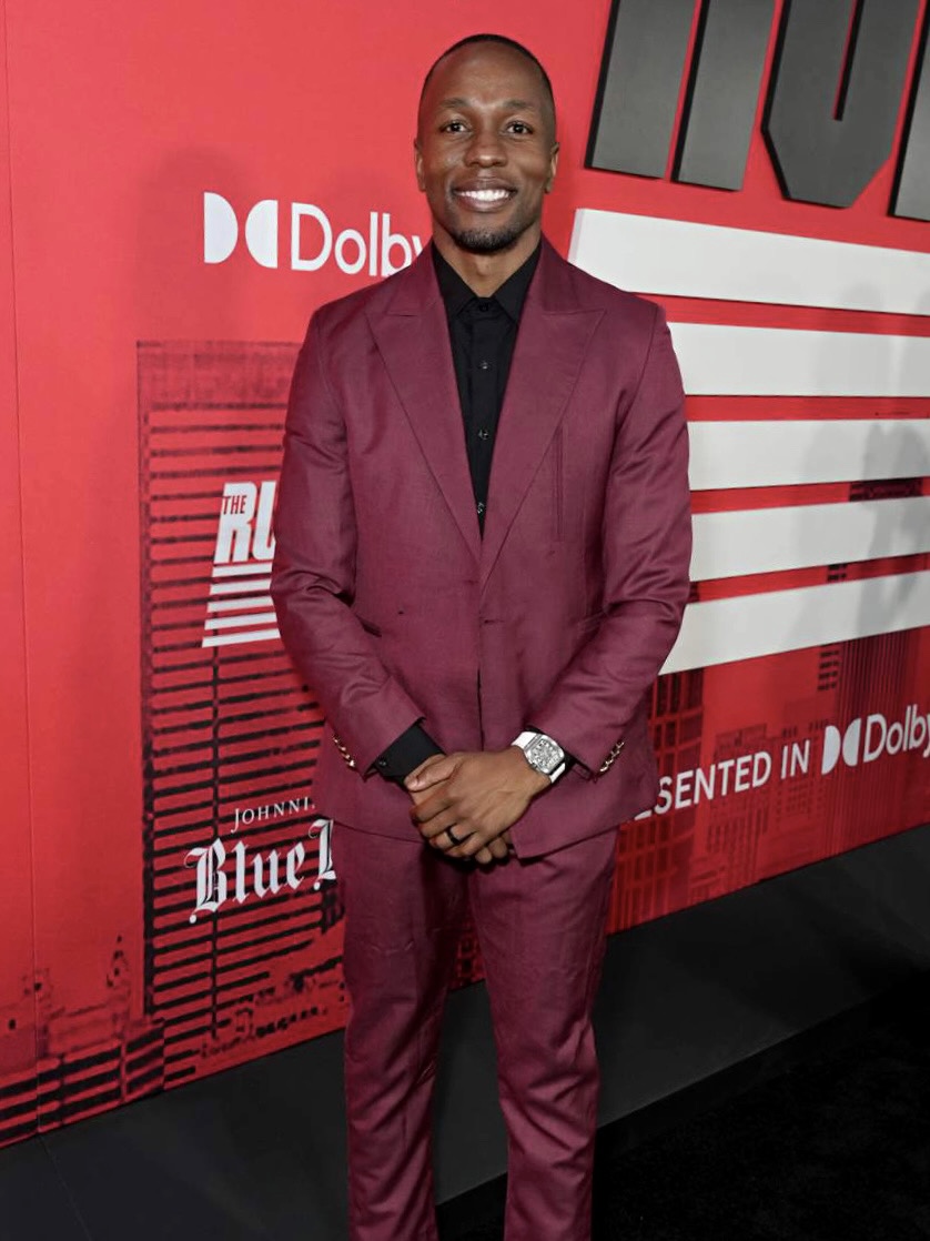 safashionweek's tweet photo. South Africaโs fastest man meets one of South Africa's finest in menswear.
Olympic gold medalist @akani_simbine steps onto the red carpet at the @runningmanmovie premiere in New York City wearing a striking burgundy @ephymol suit.
#safw #safwxephymol #akanisimbine https://t.co/3RJD7jwnZc