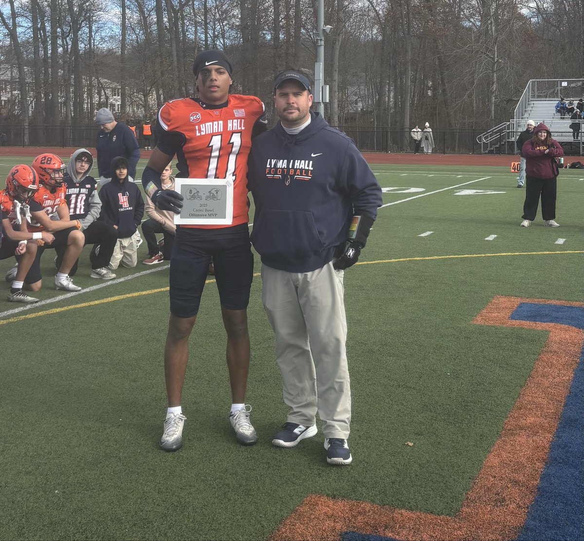 MikeMadera2's tweet image. Lyman Hall offensive MVP, Najae Hamilton, and defensive MVP, Brayden Ottochian #cthsfb #scc