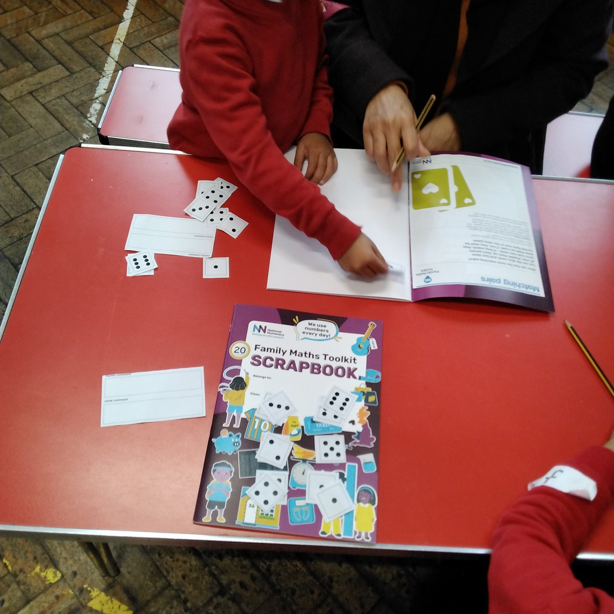 LeighPrimary's tweet image. Thank to our Nursery and Reception parents for attending our Help Your Child Love Maths workshop. It was lovely to see the children having fun with the matching sets game and exploring their Maths scrapbooks! #everydaymaths @Nat_Numeracy #memorymakers #parentworkshop