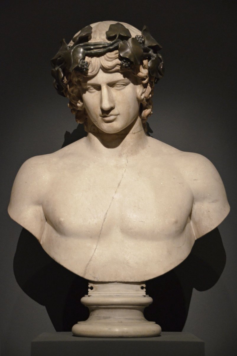 carolemadge's tweet image. Marble bust of Antinous depicted as the god Dionysus with a bronze vine wreath on his head.

The bust is believed to have been discovered at Hadrian's Villa in Tivoli. It was part of Marquis Giampietro Campana's collection and was regarded as one of his finest sculptures. After…
