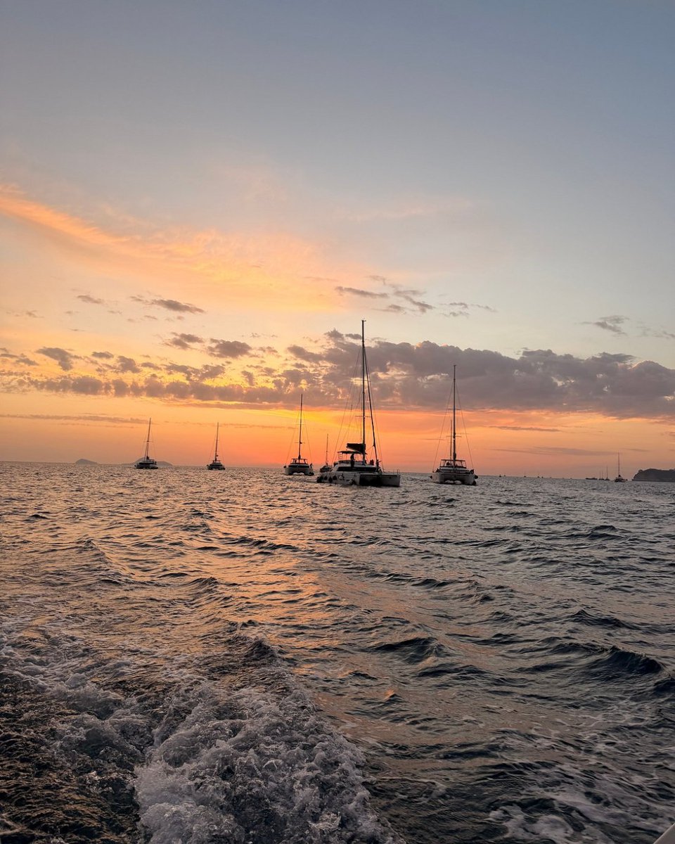 Tripadvisor's tweet image. Came for the catamaran. Stayed for the open bar and BBQ. 📍Santorini