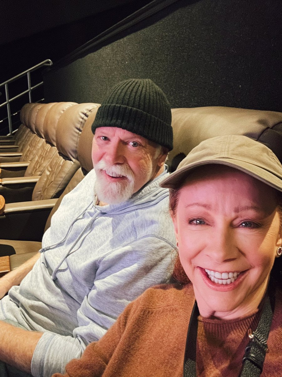 reba's tweet photo. Thanksgiving at the movies 🍿 Saw Hamnet! Somebody spilled popcorn… and he wasn’t bald. https://t.co/41EpLEmjHA