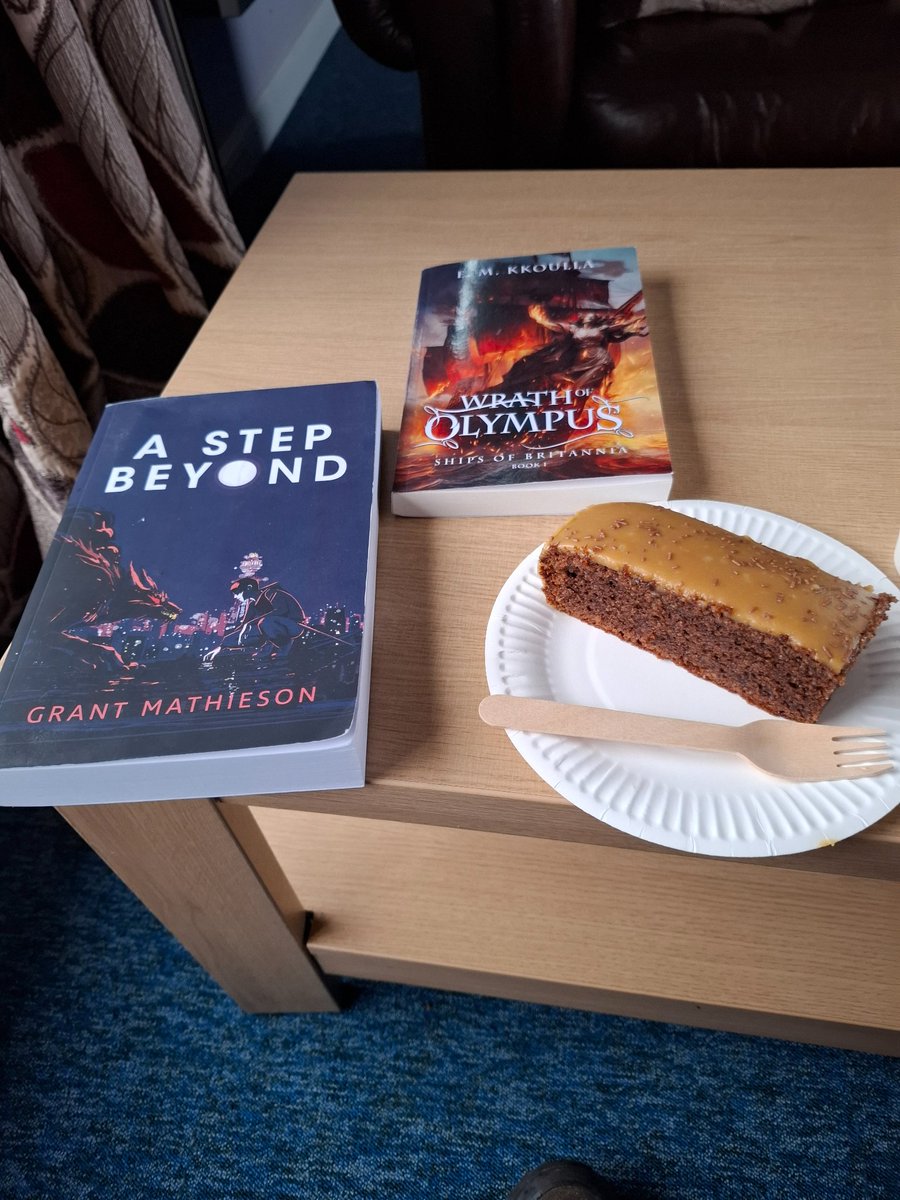 Last bit of cake and letting the books into their new home.