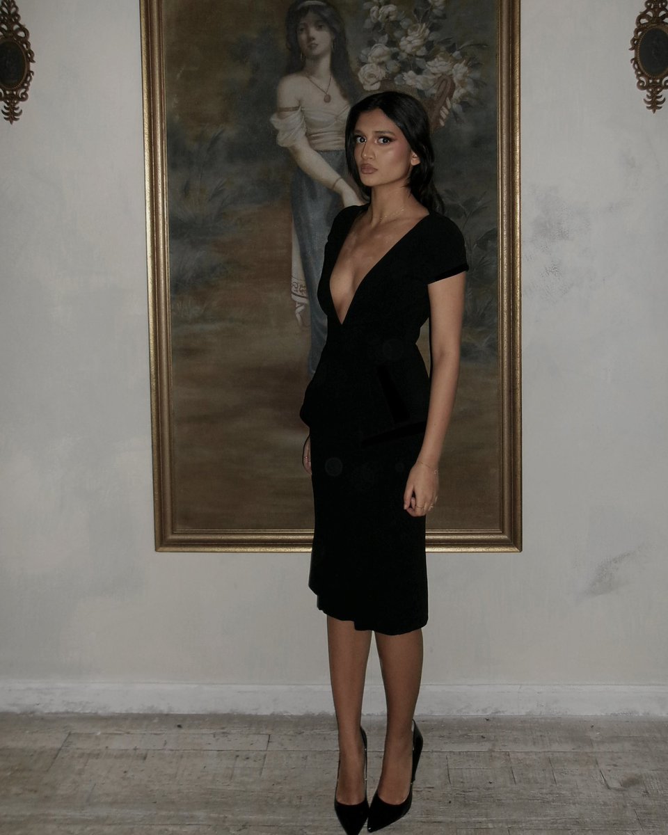 wearing Tom Ford at the Mirror Palais holiday party