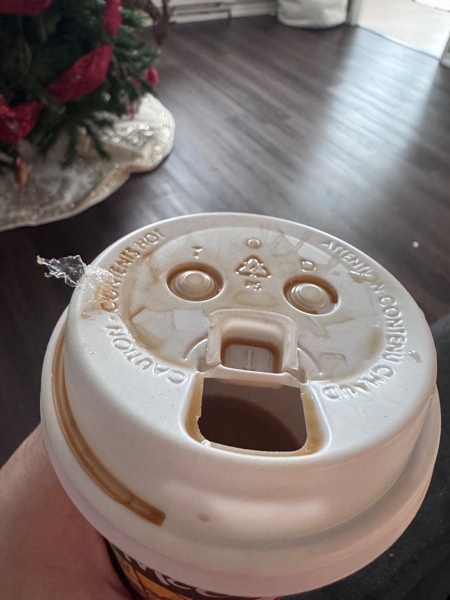 __axz's tweet photo. @McDonaldsCanada @McDonalds drinking my coffee and choked on this: 
Not acceptable 🤬 IN MY COFFEE! https://t.co/f4HrDeU32B
