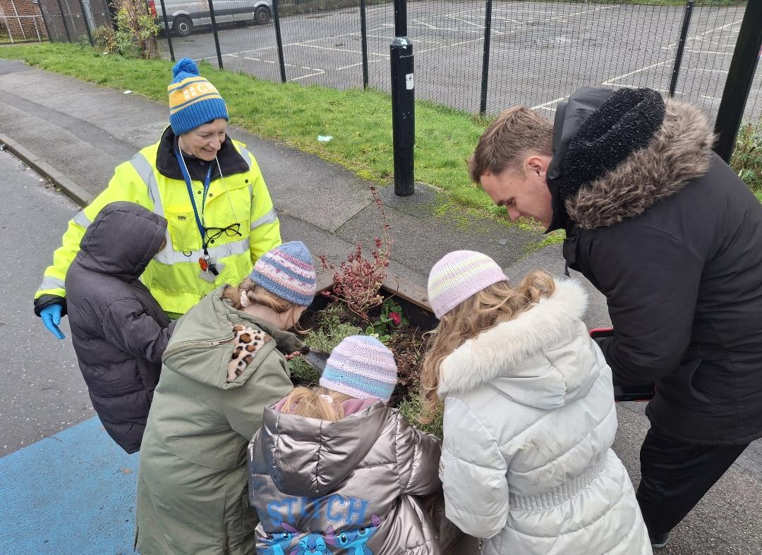 The Nature Group at #AnnsGrovePrimary added some new plants to their planters. They did this whilst wearing hats donated by the #TotleyRiseMethodistChurch Knit &amp; Natter, Craft &amp; Chatter Group, and end up turning a dull day into a colourful one!