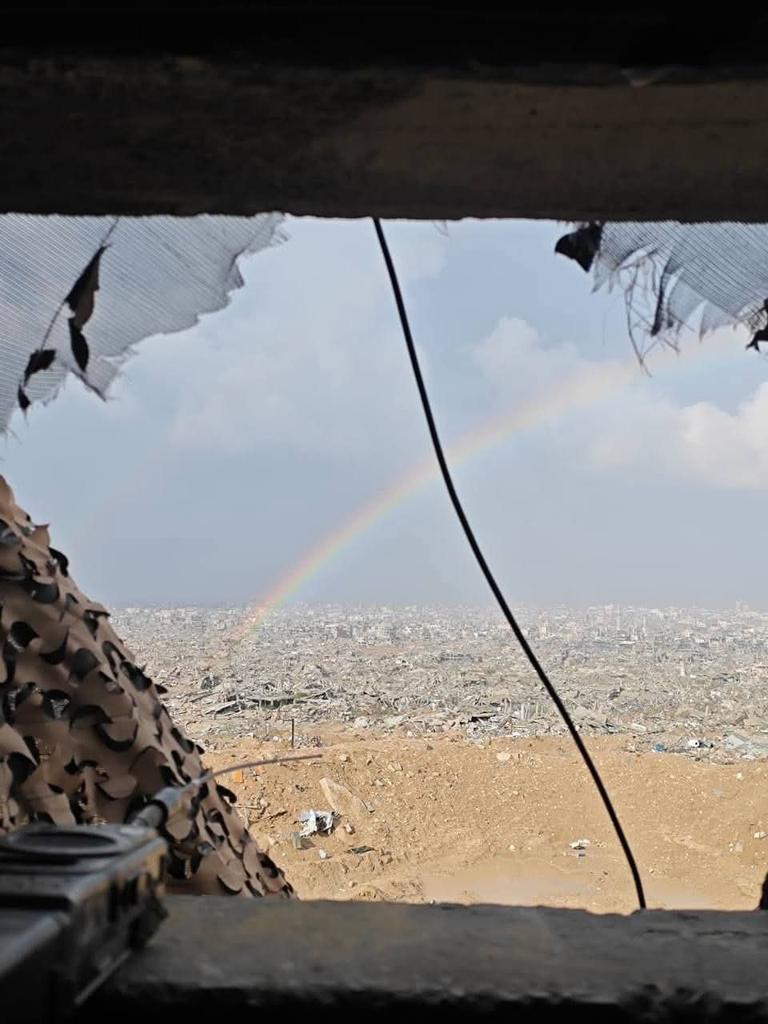 PalPress24's tweet image. A rainbow appeared this morning, visible through the opening of an Israeli army military post overlooking Shujaiya — a neighborhood that has become a pile of rubble.
Perhaps it, too, is wondering what happened to this place and its people for it to become so desolate.