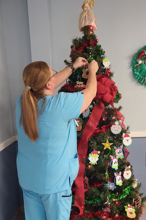 NextStepHC's tweet image. Decorating the trees is a group effort at Fall River Healthcare, and everyone gets to enjoy the finished product too! 🎄✨ #festive #TisTheSeason #holidays #community