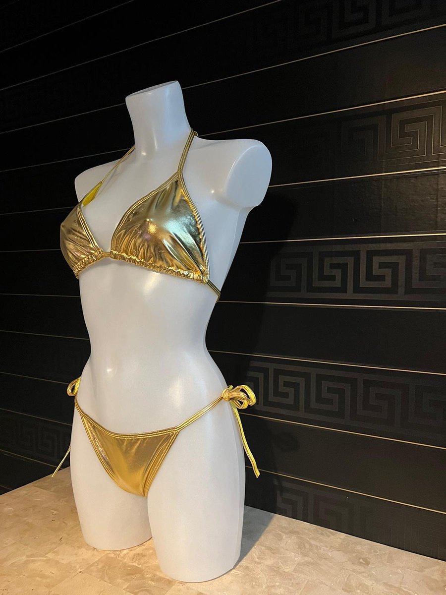 "Anyone interested in a gold bikini?"