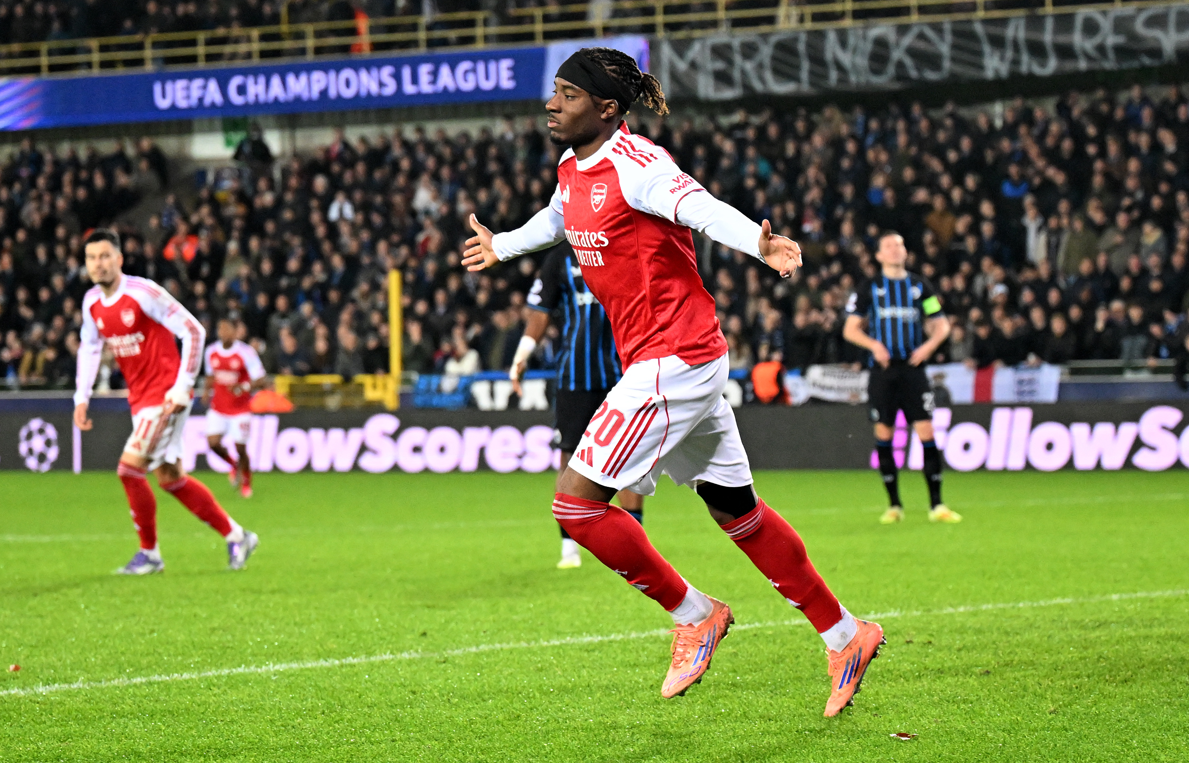 Noni Madueke celebrates scoring his second for Arsenal against Club Brugge 