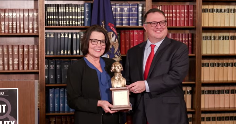 Michigan House Speaker Matt Hall and House Appropriations Chair Ann Bollin pose with the leadership award that Bollin received at last week's ALEC conference: