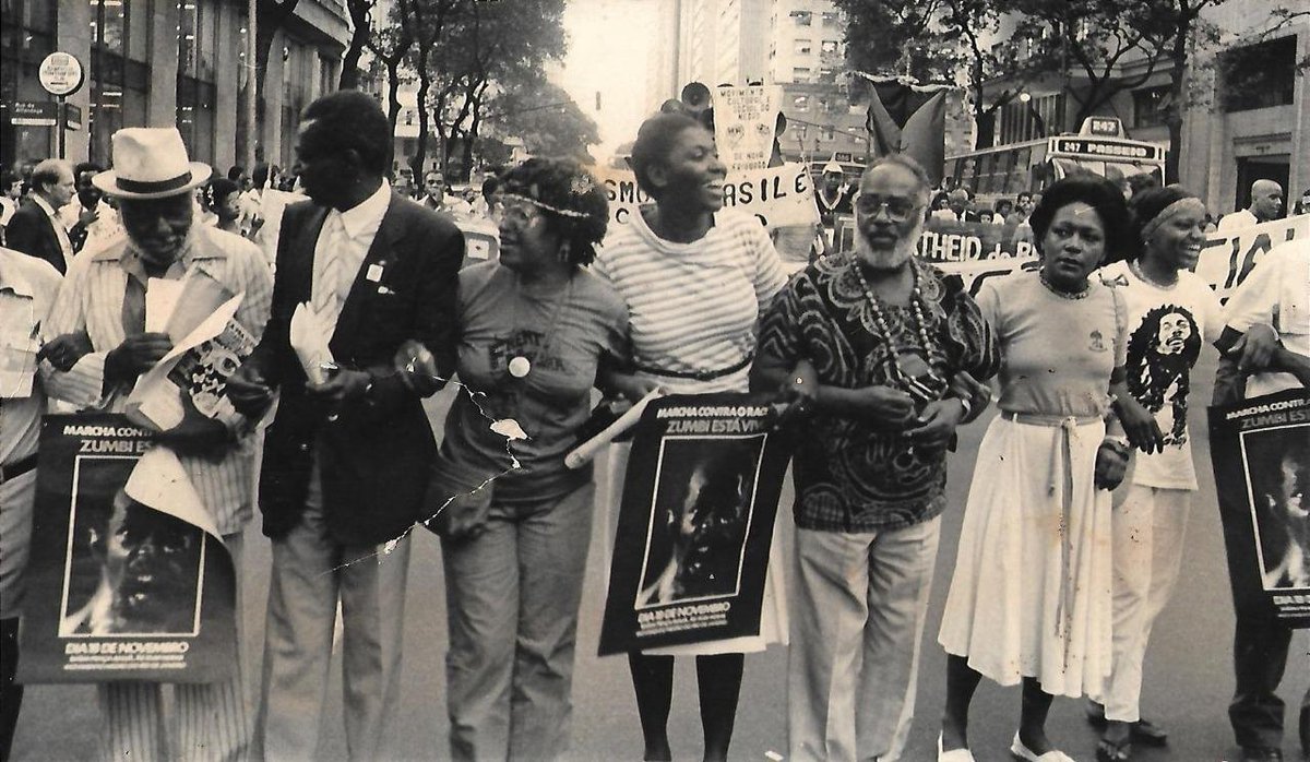Benedita da Silva, Lélia González, Abdias do Nascimento e Alberto Caó em 1983 na Avenida Rio Branco pela Igualdade Racial na nova Constituição 

(Hugo Motta nasceu em 89)