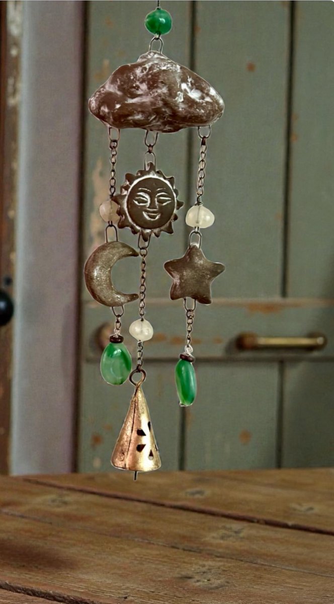 ZenCatPottery's tweet photo. Sun & Moon Wind Chime Ceramic #bohostyle #BoHoDecor #GardenDecor #WindChime #HangingDecor #SunMobile #SunWindChime https://t.co/Vp8BBnc3S0