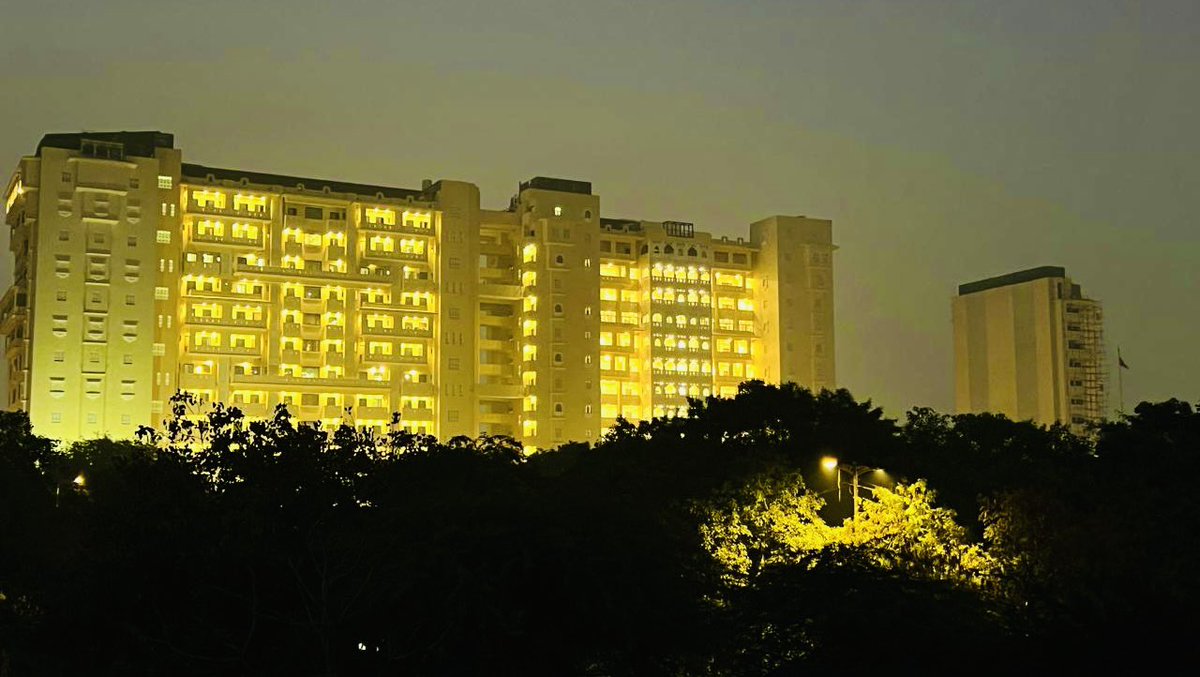 PriyankKharge's tweet photo. At first glance, you could easily mistake this building for a luxury hotel or high-end apartment complex.
But guess what it is?
This is the RSS headquarters in Delhi “Keshav Kunj”, reportedly built at a cost of around ₹200 crore, funded through “Guru Dakshina” that range from as little as ₹5 to several lakhs.
The Rashtriya Swayamsevak Sangh, an unregistered NGO, collects money from its “volunteers” as Guru Dakshina in the name of the Bhagwa Dhwaj (saffron flag), which is treated as the organisation’s eternal Guru.
So effectively, anyone can collect crores in “dakshina” in the name of a flag and still stay outside the normal scrutiny of tax authorities.
Isn’t dodging taxes and evading accountability anti national?