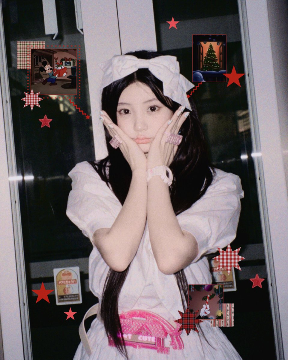 In this soft glow, I feel like a wandering winter fairy, wrapped in a ribboned dress and shy little sparkles (｡•ㅅ•｡) My hands cradle my face, and suddenly the world becomes gentle—cartoons, stars, warm lights, and the soft hum of a heart that still believes in cute miracles.