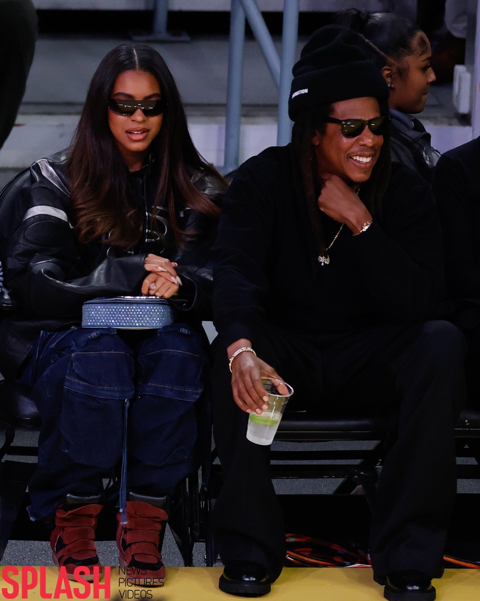 Jay-Z and his daughter Blue Ivy sit courtside for the Emirates NBA