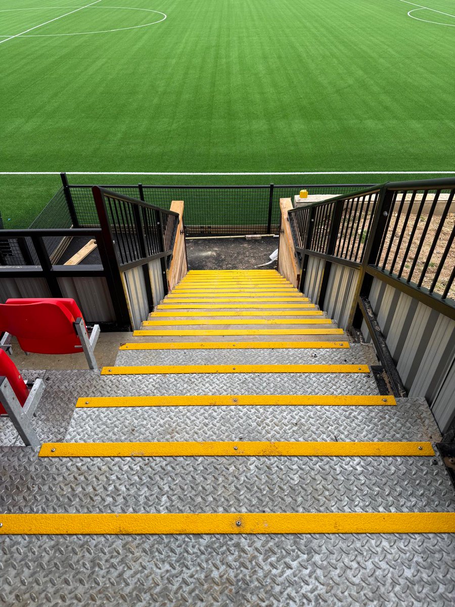 StadiaConstruct's tweet image. Newly installed hand rails and non slip nosing at Hill Park @saltdeantigers ⚽️⁠The type 4 barrier hand rails  accompany the type 7 barriers we previously installed along the front of the stand. The structure adheres fully to the green guide standards.