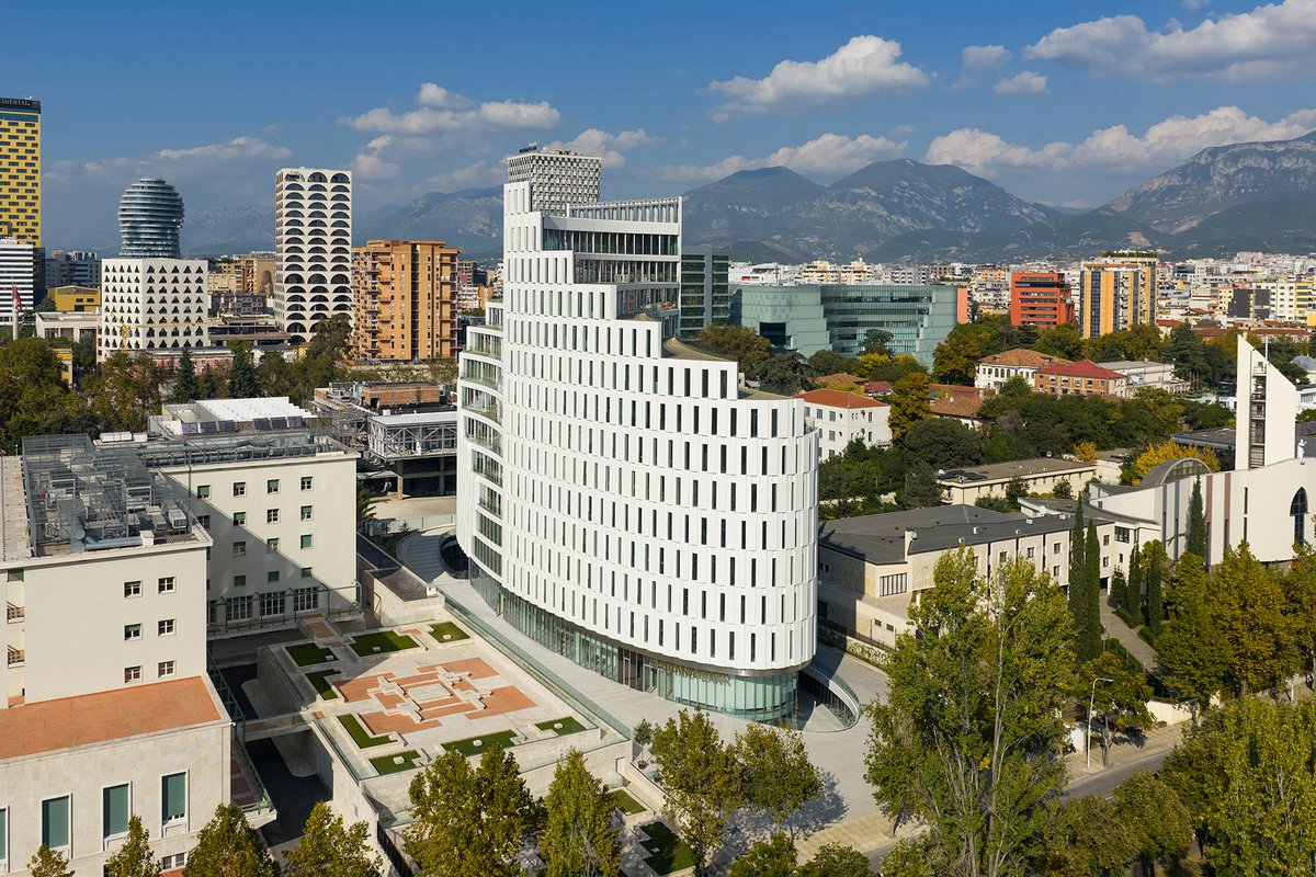GlassBalkan's tweet photo. 🏢 MET Building, Tirana - a sculpted mixed-use landmark by Mario Cucinella Architects, nominated for Mies van der Rohe Award 2026, Tirana, Albania.
#Architecture #METBuilding #MiesAward2026 https://t.co/oCzcFWiRpE