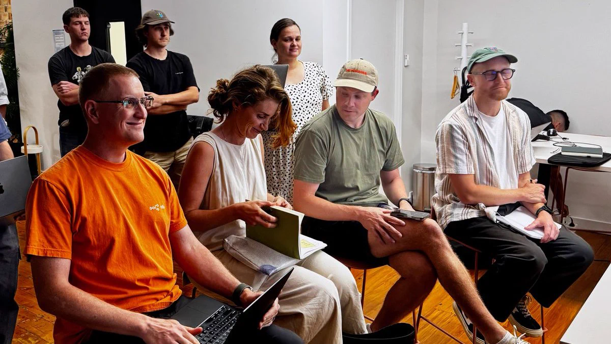 The judges watching hackathon demos!