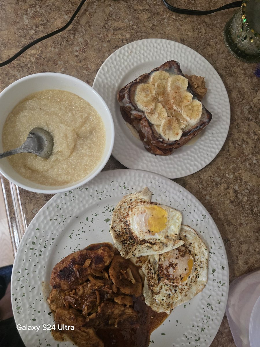 Homemade bread, made French toast with it. I enjoy bananas.  So I made a banana creme sauce for it. Grits and steak and eggs. Your welcome. Enjoy... #DivineBreakfast