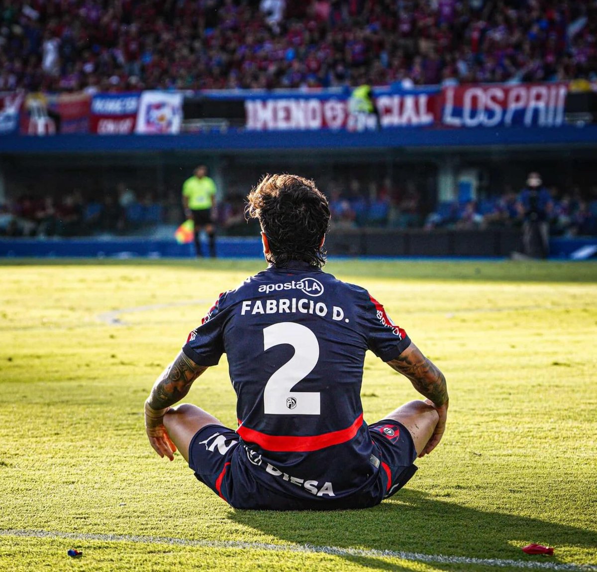 Acá, mirando el patio de Olimpia