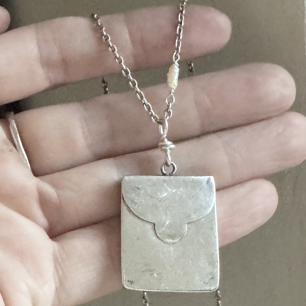 I've been researching the hallmark on this beautiful messenger bag-style stamp holder (the only one that didn't sell last night so has been sitting in my etsy shop all day rather forlorn) and 
1) it's a Chester hallmark (highly collectible) and 
2) was made in...wait for it...