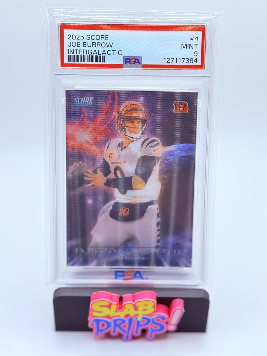 SlabDrips's tweet image. CARD OF THE DAY 
2025 Score Intergalactic Joe Burrow – PSA 9 — fiery foil parallel with Burrow set to throw.

Joe Burrow has thrown for 734 passing yards and 8 touchdowns through his first 4 games this season — will he break 2,000 passing yards this year if he stays healthy?…