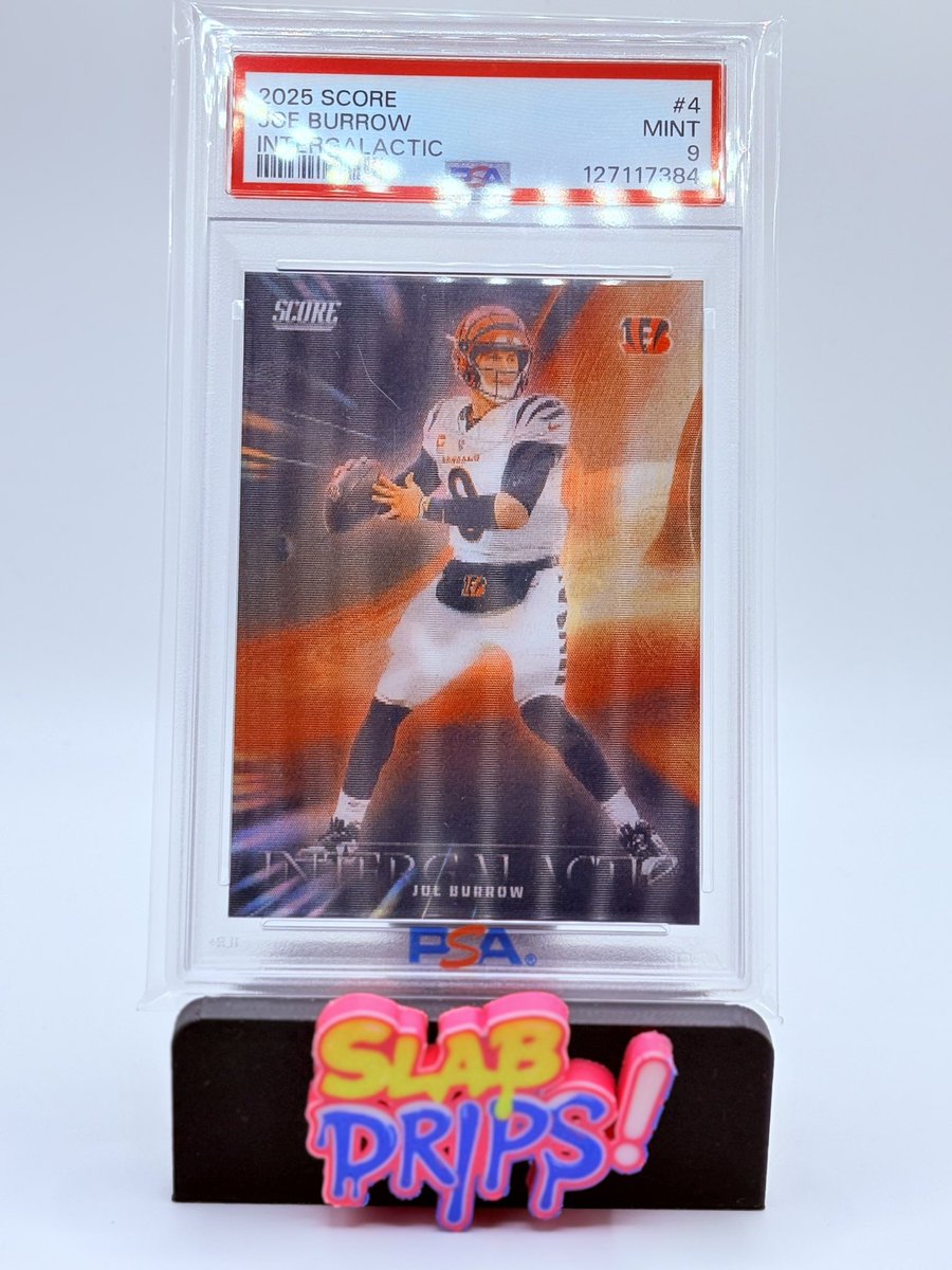 SlabDrips's tweet image. CARD OF THE DAY 
2025 Score Intergalactic Joe Burrow – PSA 9 — fiery foil parallel with Burrow set to throw.

Joe Burrow has thrown for 734 passing yards and 8 touchdowns through his first 4 games this season — will he break 2,000 passing yards this year if he stays healthy?…