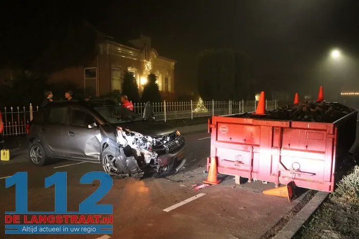 Vrouw raakt gewond na aanrijding met container