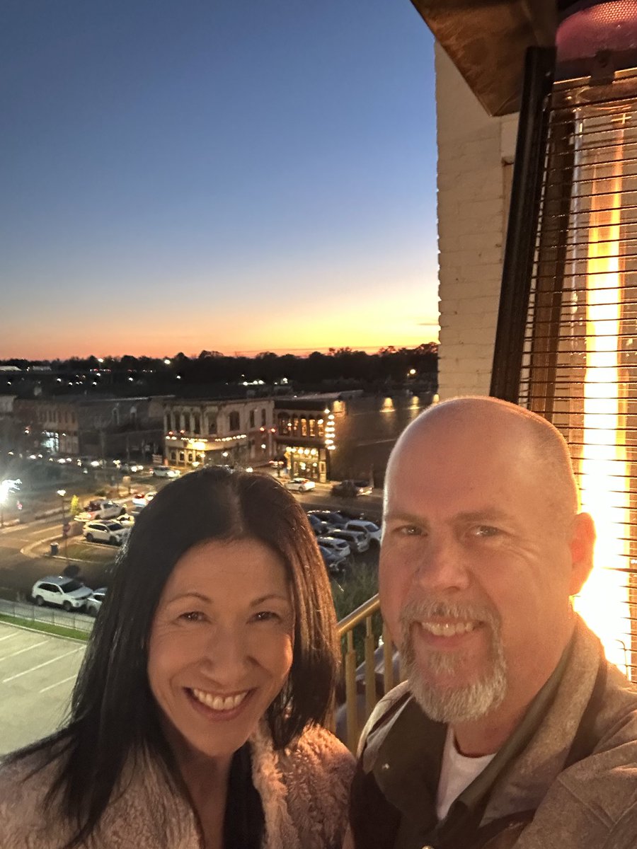 LA_ChiefsFan's tweet photo. Drinks before my wife’s company Christmas Party. Caught a great sunset. Had to get a picture with the most beautiful woman this side of the Mississippi. 
#StarBar https://t.co/Wm8TuYWd2c